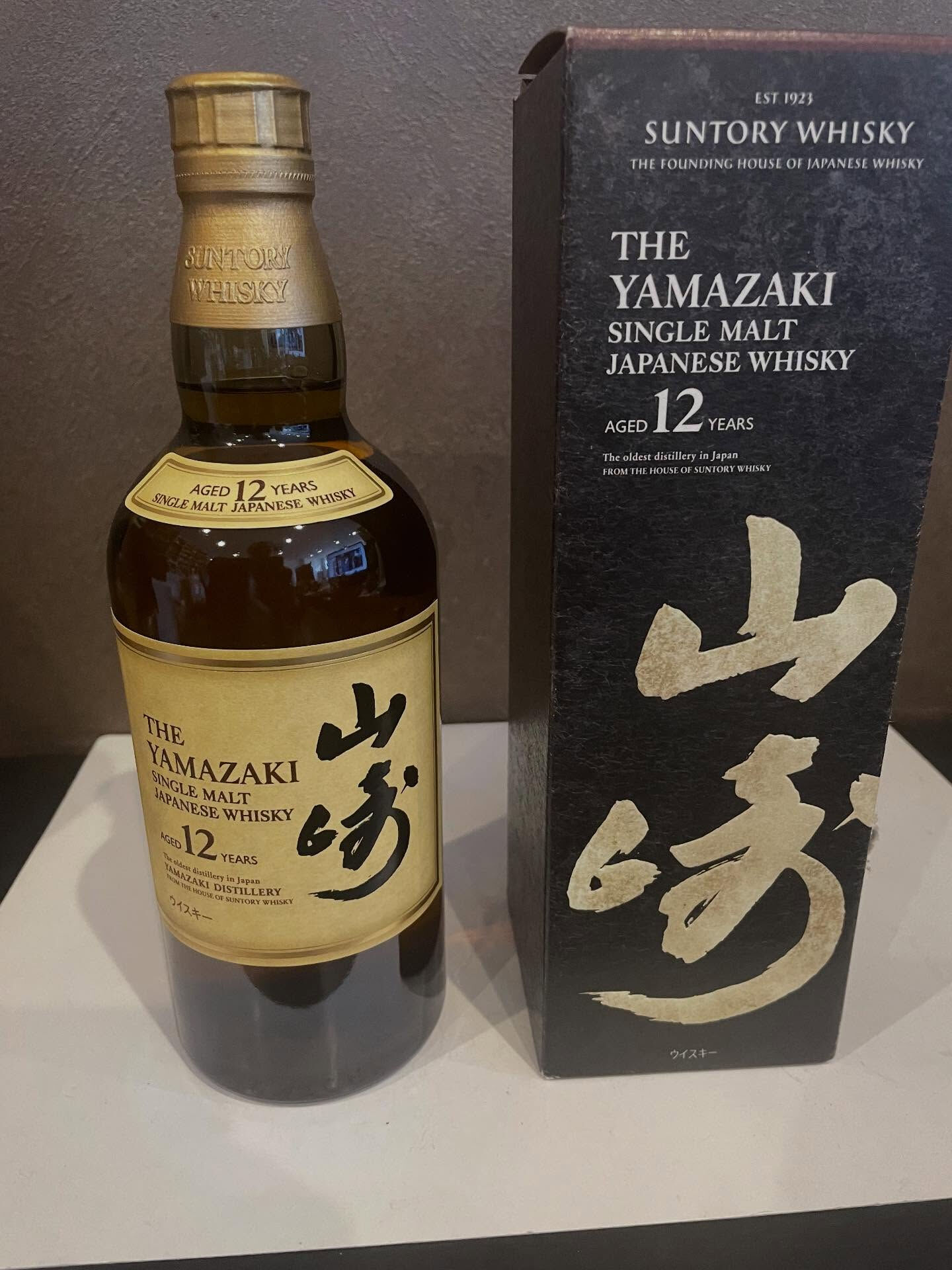 本日はリピーターのお客様よりサントリー山﨑12年のお買取をさ